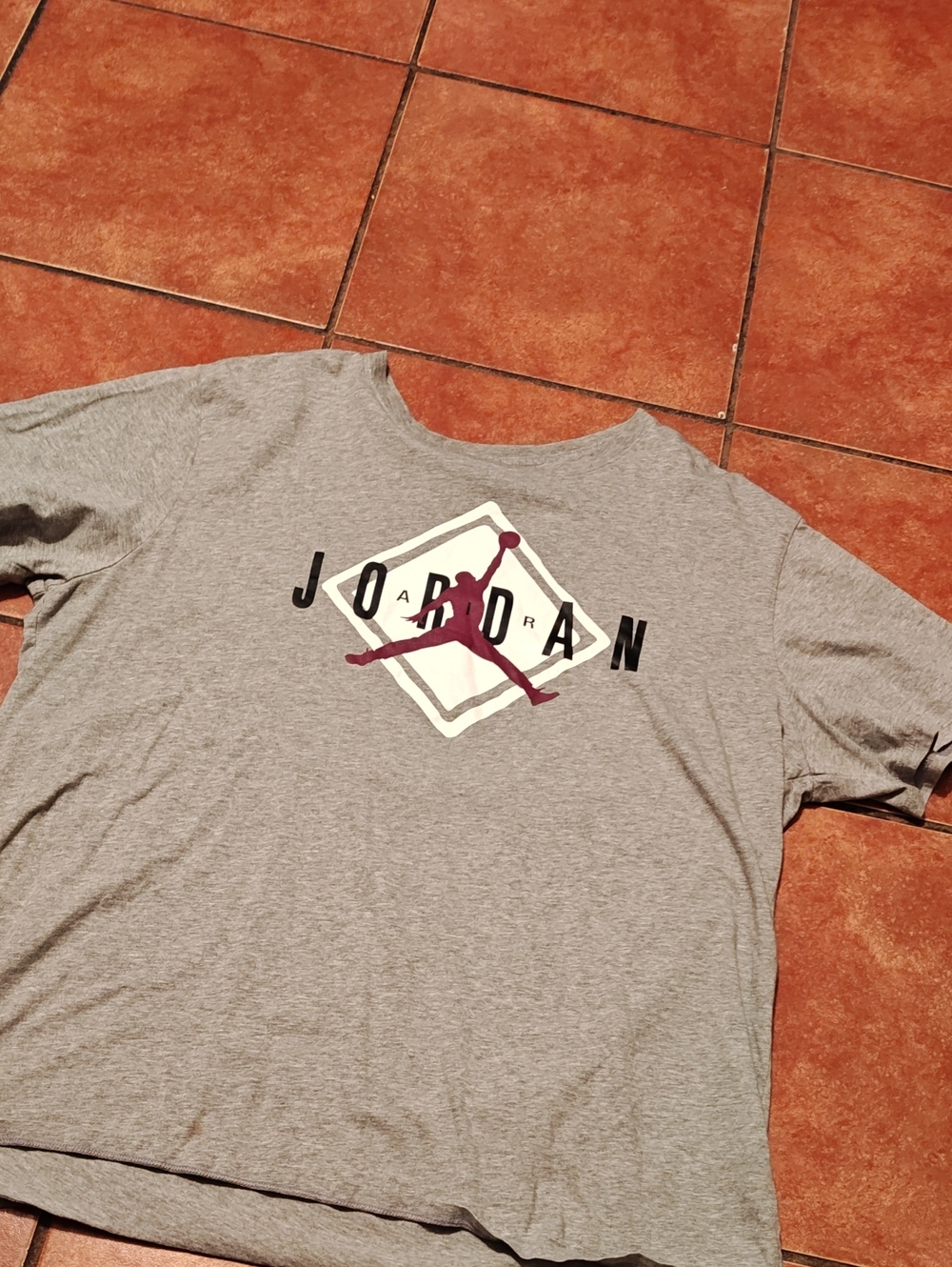 Jordan Men’s Light Gray Short Sleeve Tee with Maroon Jumpman Logo